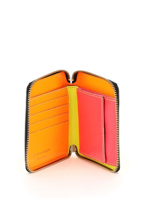 comme des garcons wallet super fluo wallet portfolio