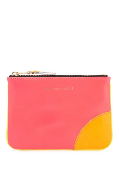 comme des garcons wallet super fluo pouch