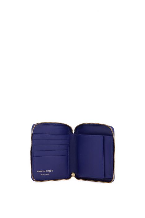 comme des garcons wallet blue leather wallet with polka dots and zip