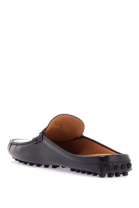 tod's black calfskin slip-on loafers with metallic strap and rubber sole