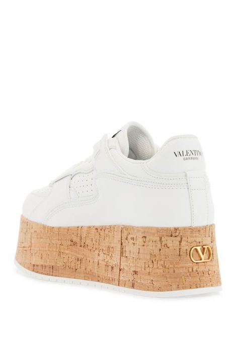 valentino garavani sneaker with cork sole and white leather perforated details